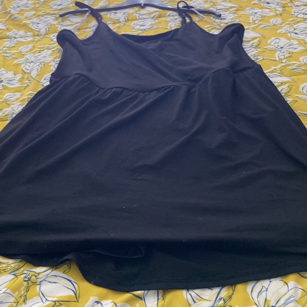 Cute black adjustable, spaghetti strap dress skort that has pockets 1X